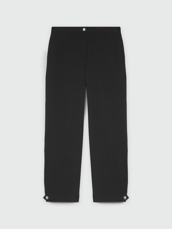 Trousers with loops at the hem