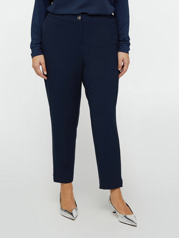 Trousers with loops at the hem