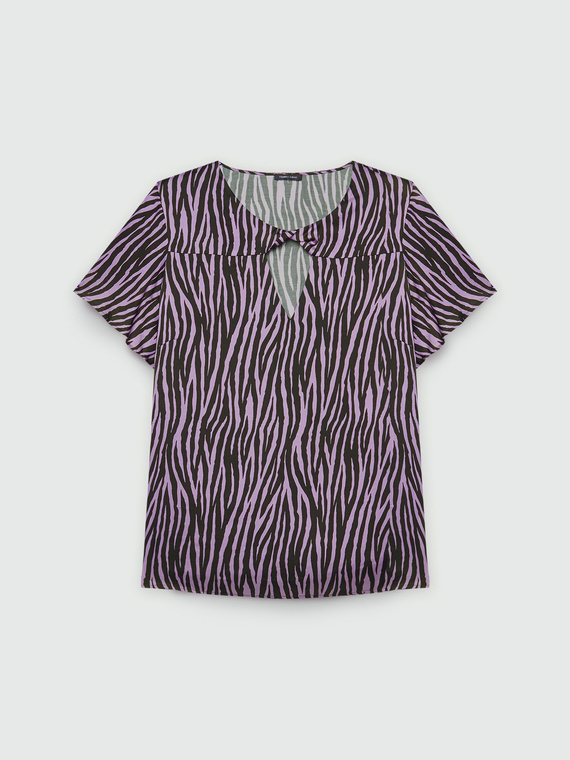 Blusa con estampado animalier con nodo