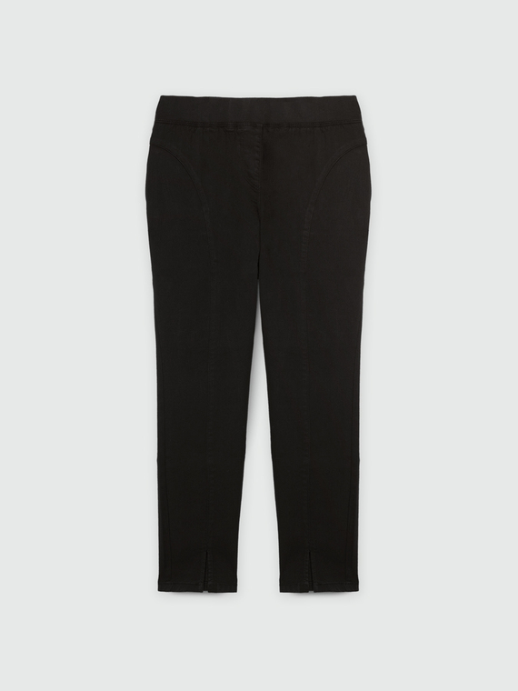 Jeggings con spacchi al fondo