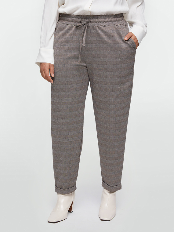 Pantaloni joggers fantasia checks con filo lurex