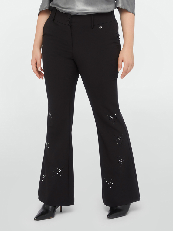 Pantaloni flare con punti luce