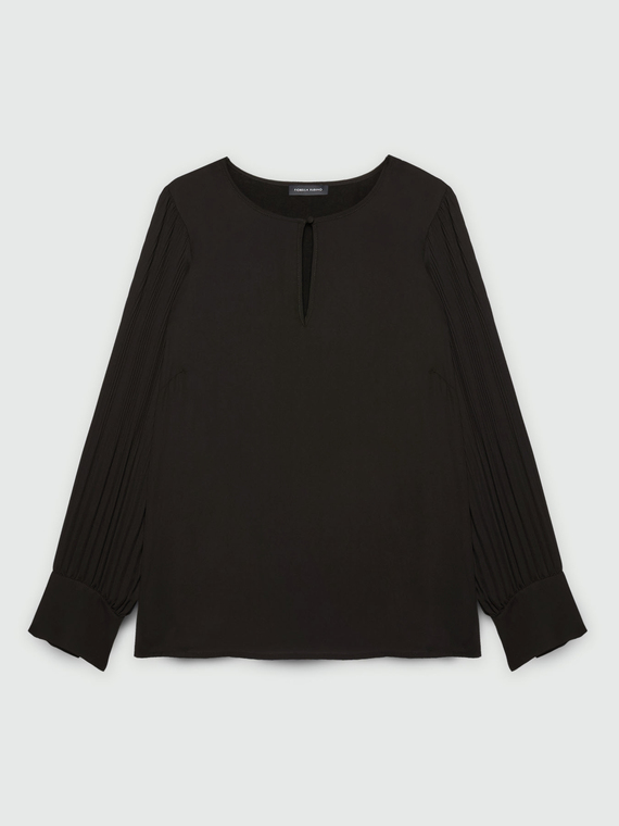 Blusa con maniche plissé