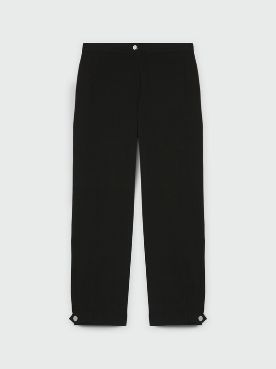 Trousers with loops at the hem